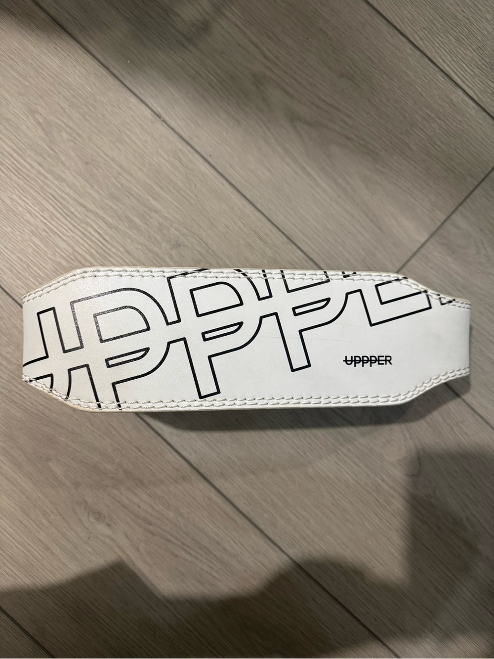 White Leather Wrist/Hand Strap with Black Logo